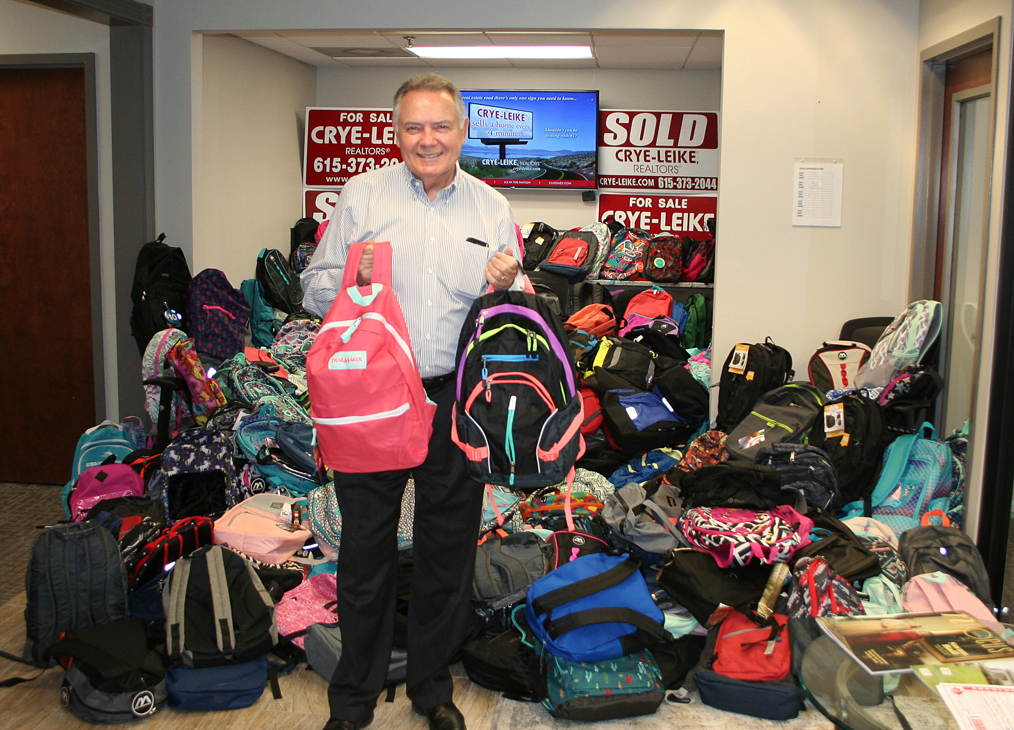 Crye-Leike Real Estate donates 494 backpacks to nonprofit for troubled students