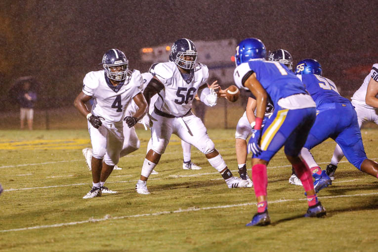 FRA football hangs on for tough, rainy win at BGA