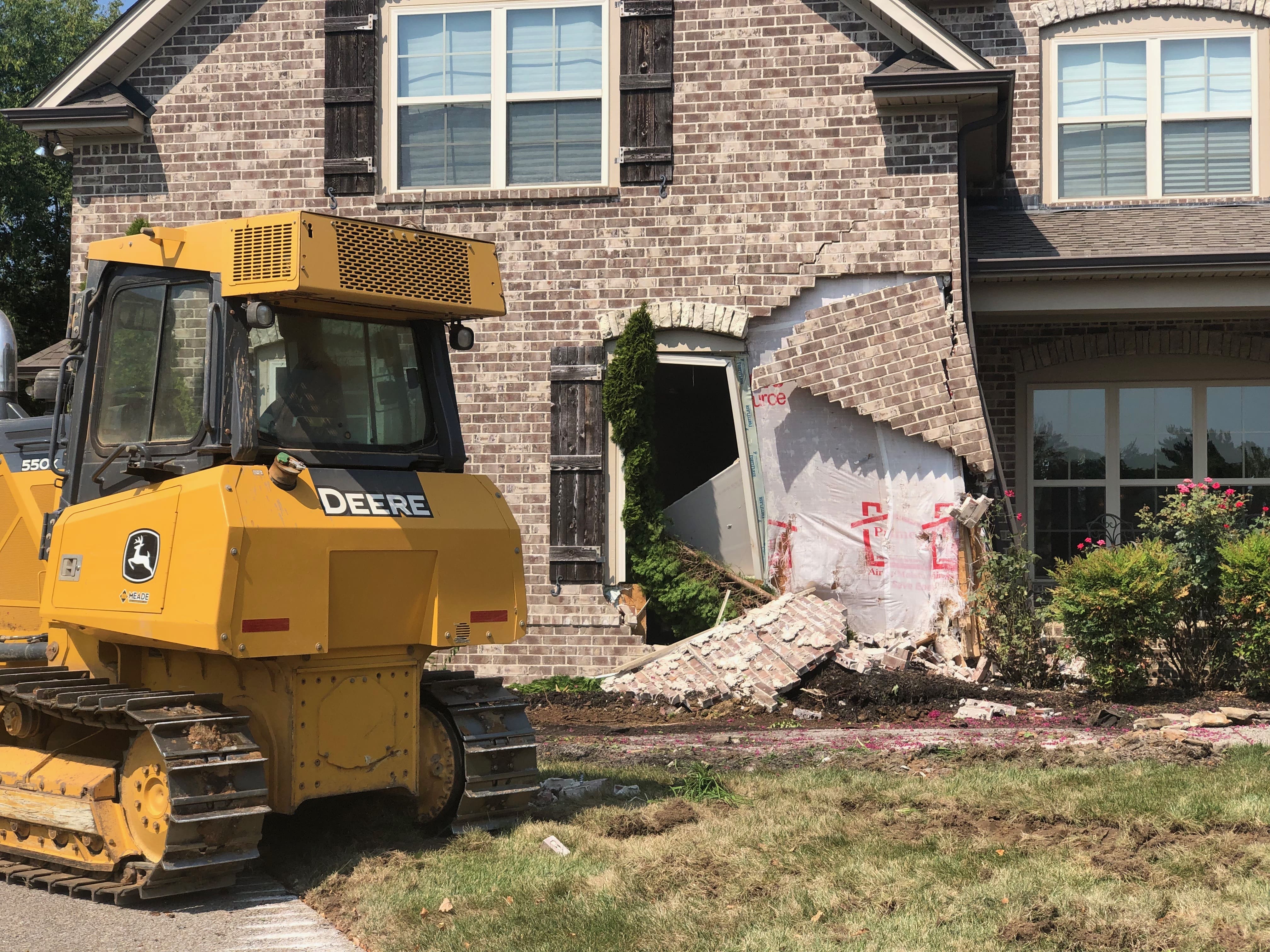 Rogue construction worker takes bulldozer to occupied Spring Hill home